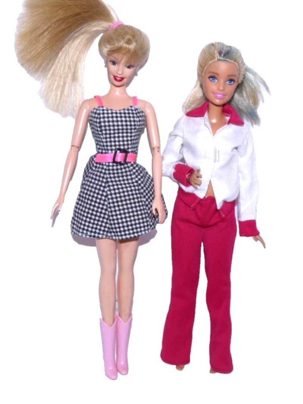 Barbie set of two dolls clothes do not match dolls and some may be vintage As Is